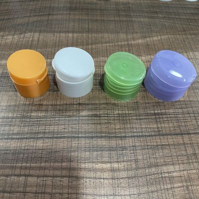 Cierre de tapa de plástico de 24 mm 28 mm 32 mm para botellas de loción de plástico de color personalizado