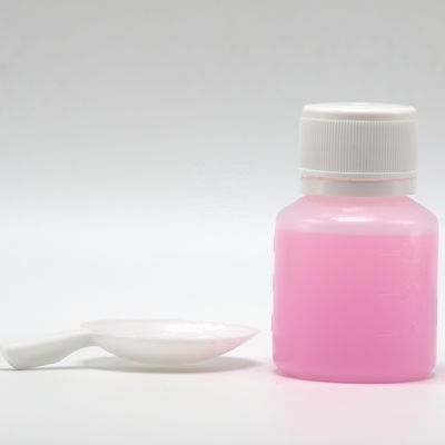 Botella de plástico PE transparente para medición de medicamentos líquidos de 30 ml de capacidad y cuchara