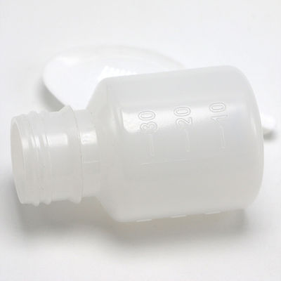 Botella de plástico PE transparente para medición de medicamentos líquidos de 30 ml de capacidad y cuchara