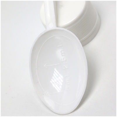 Botella de plástico PE transparente para medición de medicamentos líquidos de 30 ml de capacidad y cuchara
