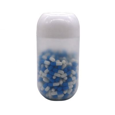 Capo de tornillo 550ML PP en forma de cápsula Jar de plástico de alimentos para dulces de galletas de color personalizado