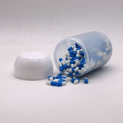 Capo de tornillo 550ML PP en forma de cápsula Jar de plástico de alimentos para dulces de galletas de color personalizado