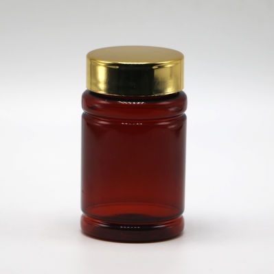 Botella de 80 ml de píldoras PET con color personalizado y tapas de revestimiento dorado plateado