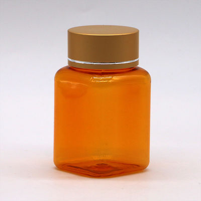 Botella de píldoras de 90 ml / 3 oz PET cuadrada amarilla / naranja con tapa de oro rosa y sello térmico