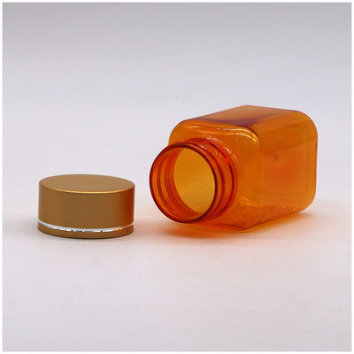 Botella de píldoras de 90 ml / 3 oz PET cuadrada amarilla / naranja con tapa de oro rosa y sello térmico
