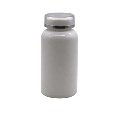 Botella de almacenamiento de pastillas de plástico HDPE de forma redonda de 200 ml con tapa invertida y material PE