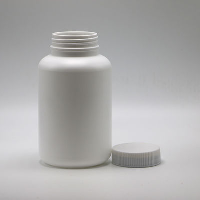 Contenedor de medicamentos con tapa resistente a niños