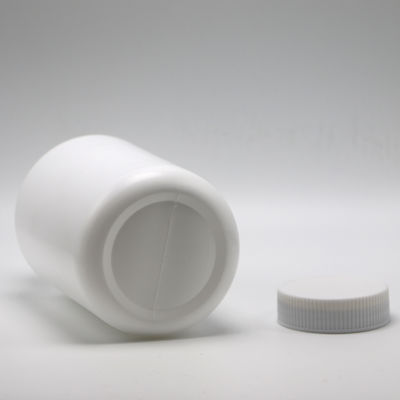 Contenedor de medicamentos con tapa resistente a niños